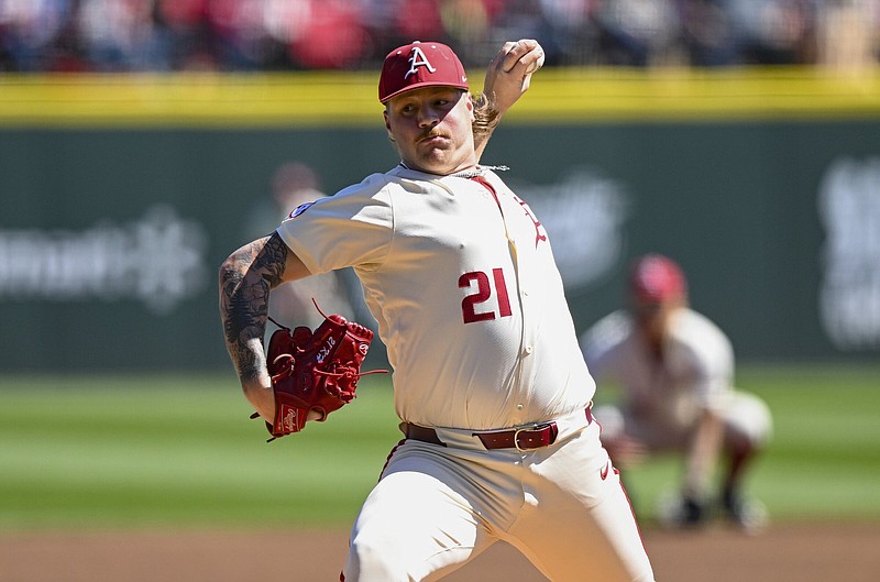 Arkansas Mason Molina (21) pitches, Sunday, March 17, 2024 during the first inning of a baseball game at Baum-Walker Stadium in Fayetteville. Visit nwaonline.com/photos for today's photo gallery...(NWA Democrat-Gazette/Charlie Kaijo)