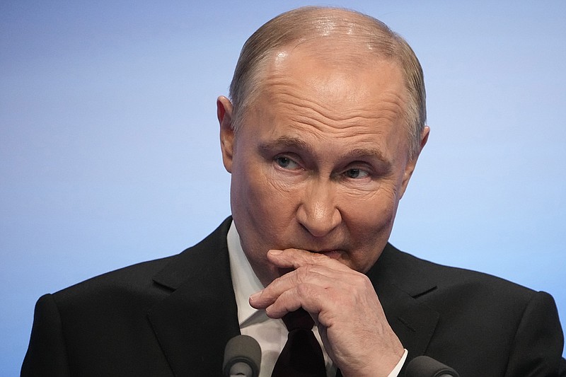 Russian President Vladimir Putin speaks on a visit to his campaign headquarters after the presidential election in Moscow, Russia, early Monday, March 18, 2024. (AP Photo/Alexander Zemlianichenko)