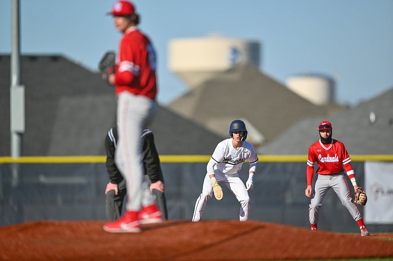 Bentonville West's Eli Nester leads off second base in the first inning on Monday, March 18, 2024, at Wolverine Stadium in Centerton. The Bentonville West Wolverines hosted the Webb City (MO) Cardinals in a non-conference matchup. Visit nwaonline.com/photo for today's photo gallery.(NWA Democrat Gazette/Caleb Grieger)