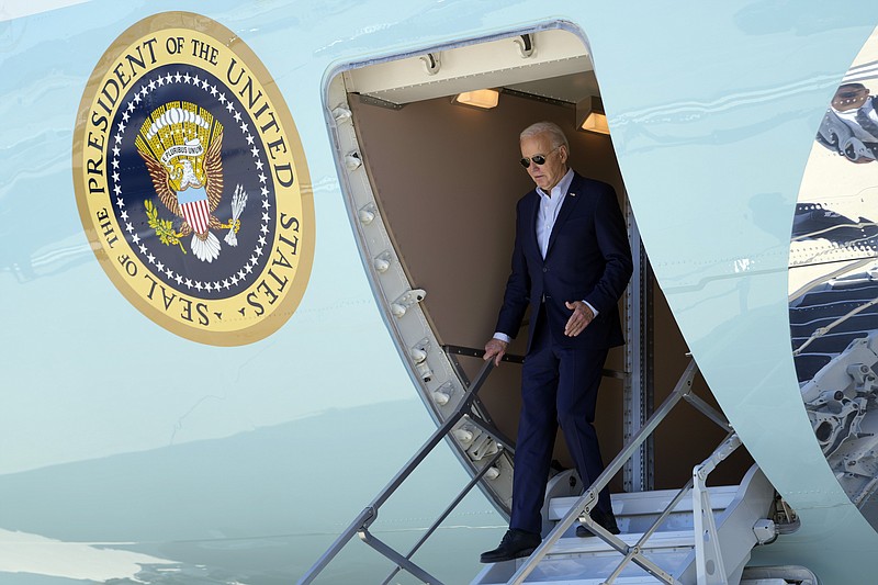 President Joe Biden arrives on Air Force One at Harry Reid International Airport, Tuesday March 19, 2024, in Las Vegas, for campaign events. (AP Photo/Jacquelyn Martin)