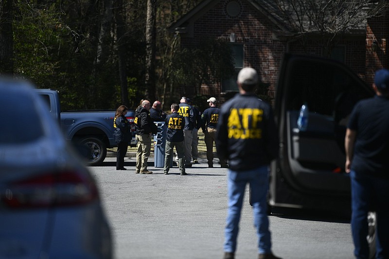 ATF agents wait outside as the Arkansas State Police (ASP) Criminal Investigation Division investigates an officer-involved shooting that occurred today around 6 a.m. at 4 Durance Court, Little Rock, while the Bureau of Alcohol, Tobacco, Firearms and Explosives was serving a federal search warrant. Bryan Malinowski, 53, was injured with gunshot wounds and treated on scene by paramedics before being transported to a local hospital. He later died from his injuries.  (Arkansas Democrat-Gazette/Stephen Swofford)