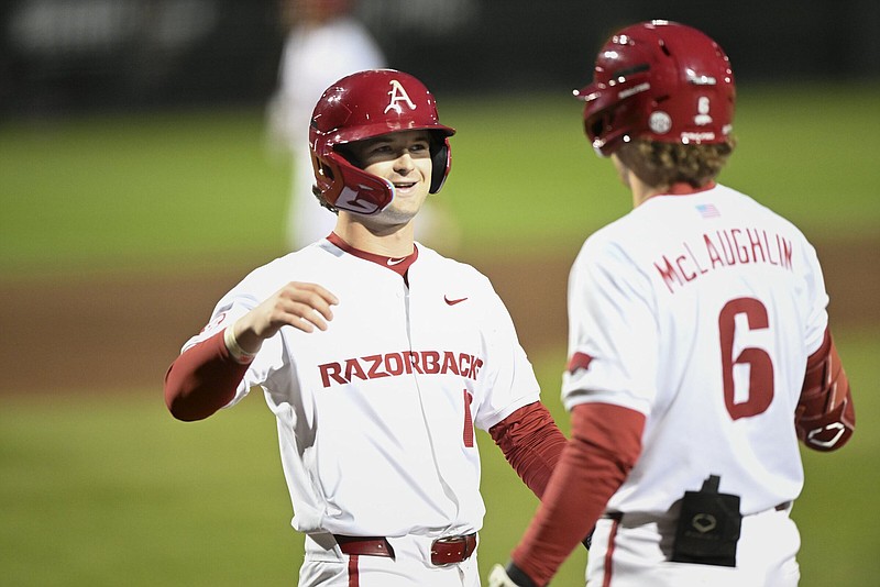 University of Arkansas second baseman Peyton Stovall (left) has played the past 7 games, batting .321 with 2 home runs and 9 RBI going into the No. 1 Razorbacks’ series at No. 24 Auburn that begins today. “His at-bats have been really good,” Coach Dave Van Horn said. “I’d have to say he’s been amazing, really. For a guy that’s got [28] at-bats, it doesn’t look like it. It looks like he’s got 120.”
(NWA Democrat-Gazette/Charlie Kaijo)