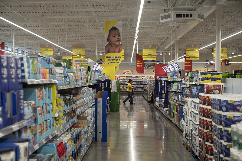 A shopper pushes a cart through a Lidl grocery store that debuted in Washington’s Ward 7 in September 2022.
(The Washington Post/Robinson Ch'z)