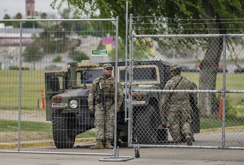 National Guard and other law enforcement are stationed Wednesday at a now closed off Shelby Park in Eagle Pass, Texas. Video at arkansasonline.com/321texasborder/.
(AP/Houston Chronicle/Raquel Natalicchio)