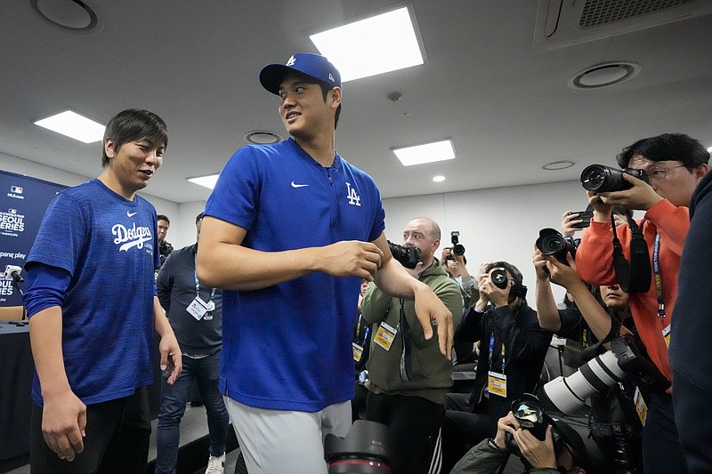 Shohei Ohtani (right) of the Los Angeles Dodgers and his interpreter, Ippei Mizuhara, leave after a news conference ahead of a baseball workout last Saturday in Seoul, South Korea. The firing of Ohtani’s interpreter by the Dodgers over allegations of illegal gambling has highlighted an issue many outside of California don’t realize: Sports betting is still against the law in the nation’s most populous state.
(AP/Lee Jin-man)