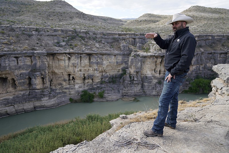 Terrell County Sheriff Thaddeus Cleveland gives a tour of the Bone Water Crossing on the Rio Grande River, Thursday, March 21, 2024, in Terrell County, Texas. (AP Photo/Erik Verduzco)