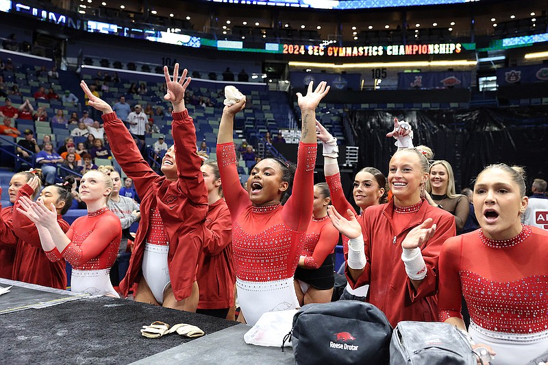 Arkansas gymnasts celebrate during the SEC Gymnastics Championships on Saturday, March 23, 2024, in New Orleans. (Photo via SEC Media Portal)