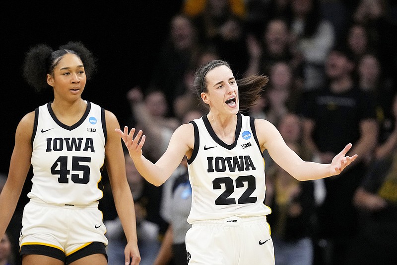 Iowa guard Caitlin Clark looks to an official for a foul call on Holy Cross during Saturday afternoon's first-round NCAA Tournament game in Iowa City, Iowa. (The Associated Press)