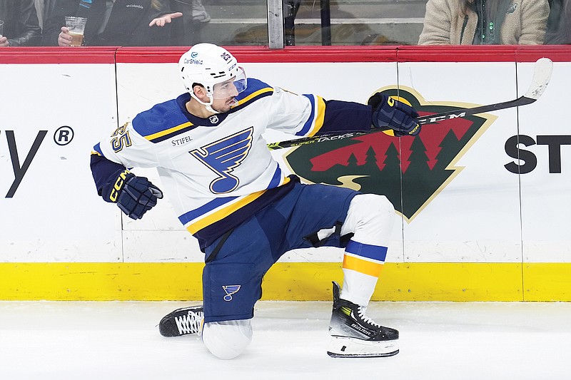 Blues center Jordan Kyrou celebrates after scoring during the third period of Saturday’s game against the Wild in St. Paul, Minn. (Associated Press)