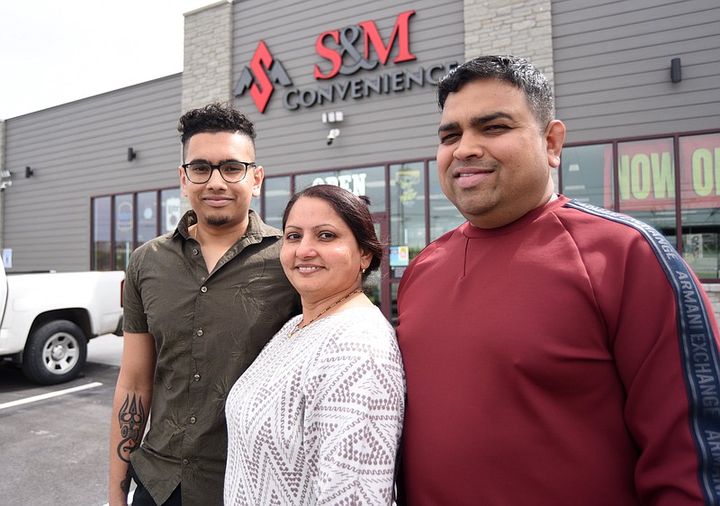 Staff photo by Matt Hamilton/ From left, Raj, Sangita and Mukesh Patel at S&M Convenience store on Monday, March 25, 2024.