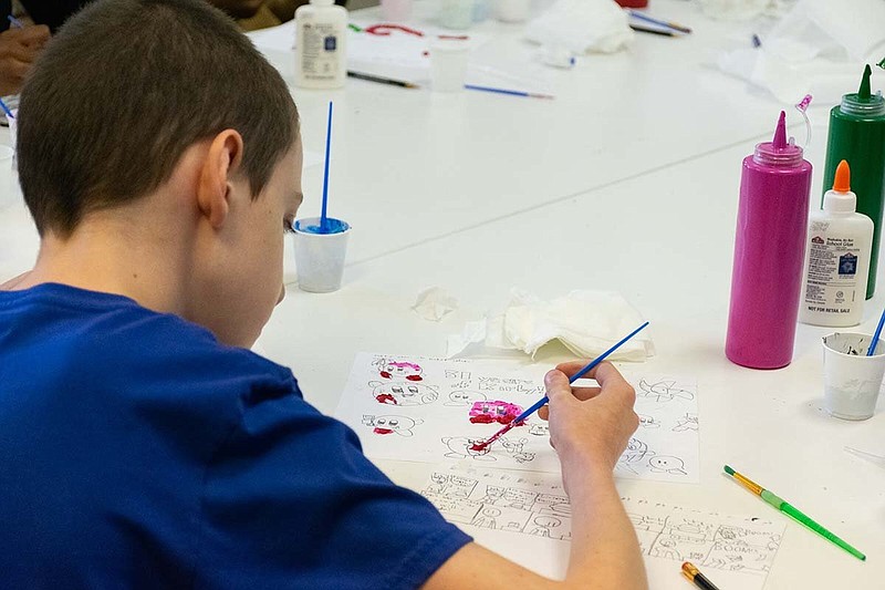 A student paints during art camp at the ARTx3 Campus in June 2023. The site will host art camps for ages 7-17 from June 10-14, 2024. (Special to The Commercial)