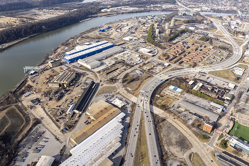 148Films / The former Alstom Power tract on the Tennessee River, now called The Bend, is shown in an aerial photo earlier this year. Also shown is the College Hill Courts housing project on the Westside.