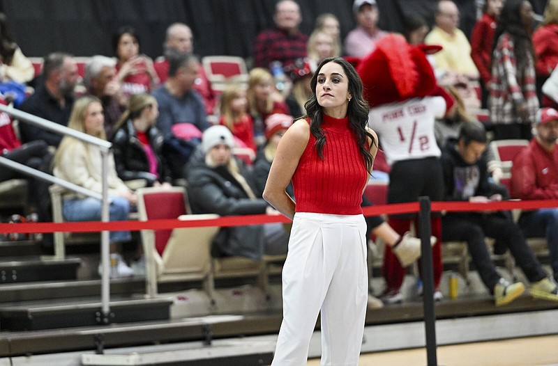 Arkansas Head Coach Jordyn Wieber looks on, Friday, January 12, 2024 during a gymnastics meet at Barnhill Arena in Fayetteville. The Arkansas gymnastics team hosted Georgia in the first meet of the season. Visit nwaonline.com/photos for today's photo gallery...(NWA Democrat-Gazette/Charlie Kaijo)