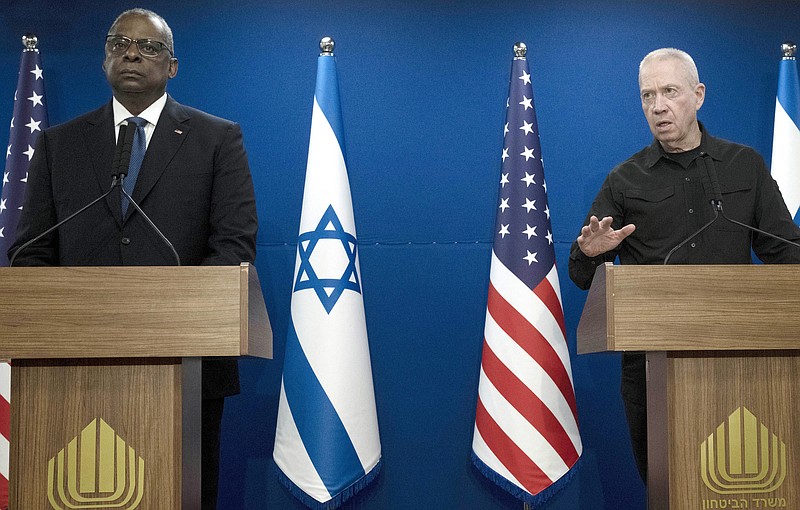 FILE - Israel Minister of Defense Yoav Gallant, right, speaks during a joint statement with Secretary of Defense Lloyd Austin, in Tel Aviv, Israel, Dec. 18, 2023. The Pentagon says Austin will meet with Gallant on Tuesday, March 26, 2024, and discuss ways to address the Hamas threat other than conducting a ground invasion of the southern Gaza city of Rafah. (AP Photo/ Maya Alleruzzo, File)