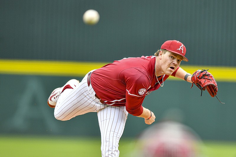Arkansas starting pitcher Ben Bybee (40) delivers to the plate, Tuesday, March 26, 2024, during the first inning against the UA-Little Rock Trojans at Baum-Walker Stadium in Fayetteville. Visit nwaonline.com/photo for today's photo gallery..(NWA Democrat-Gazette/Hank Layton)