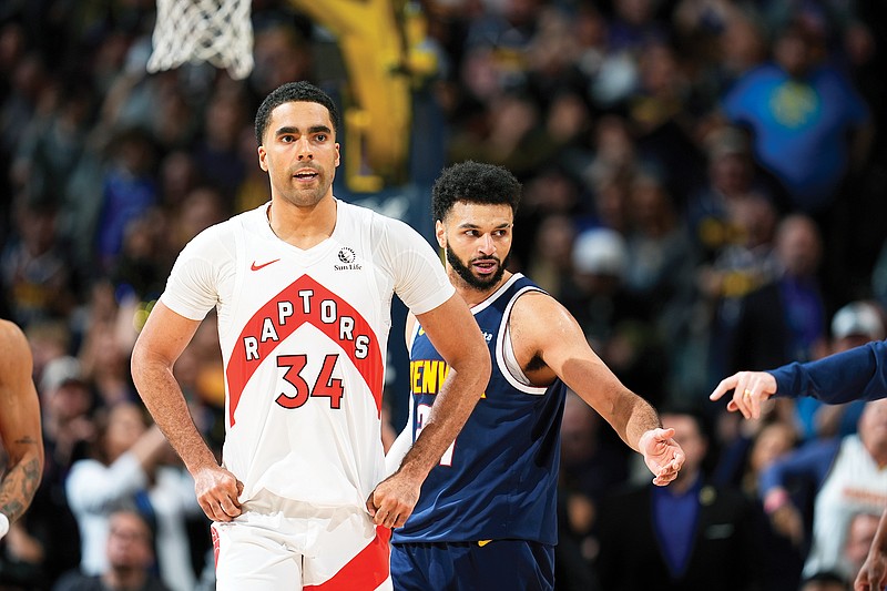 Raptors center Jontay Porter stands on the court during a game earlier this month against the Nuggets in Denver. (Associated Press)