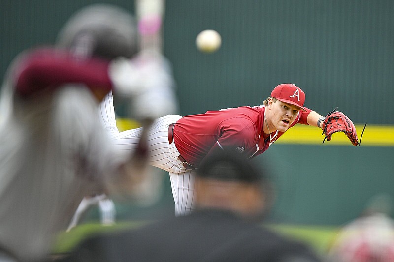 Arkansas starting pitcher Ben Bybee (40) delivers to the plate, Tuesday, March 26, 2024, during the first inning of the Razorbacks’ 11-0 run-rule victory over the UA-Little Rock Trojans at Baum-Walker Stadium in Fayetteville. Visit nwaonline.com/photo for today's photo gallery..(NWA Democrat-Gazette/Hank Layton)