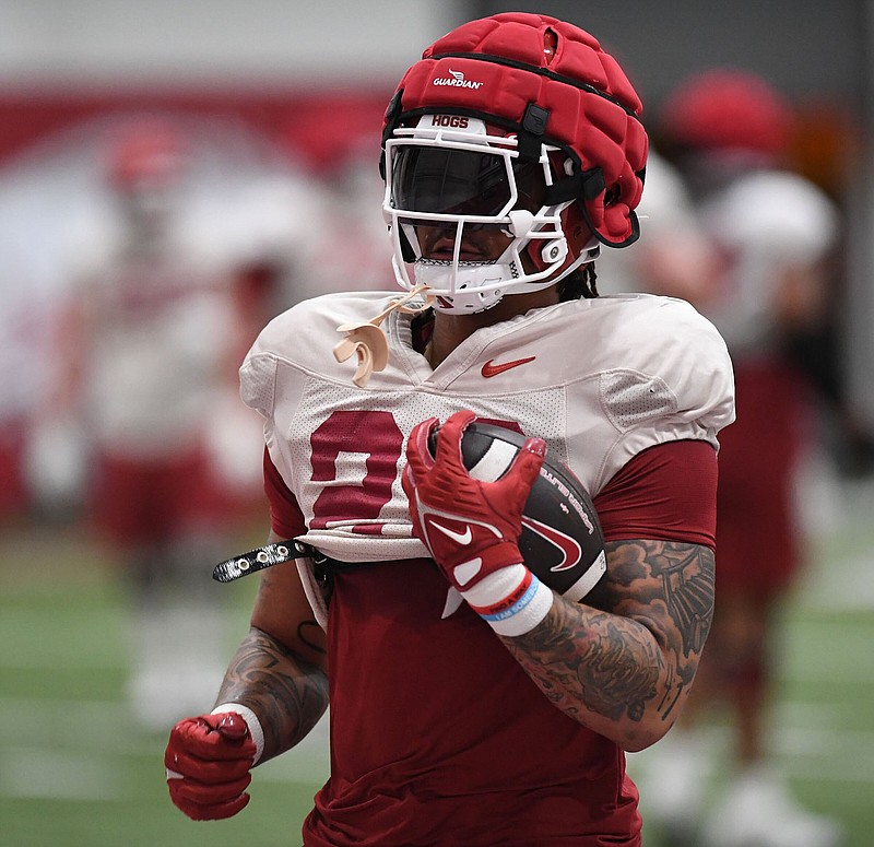 Running back Ja’Quinden Jackson played in 12 games at Utah last season, leading the Utes with 797 rushing yards, four rushing touchdowns and three 100-yard games. He did all that despite an ankle injury that led to a tendon becoming separated from the bone in his right foot.
(NWA Democrat-Gazette/Andy Shupe)