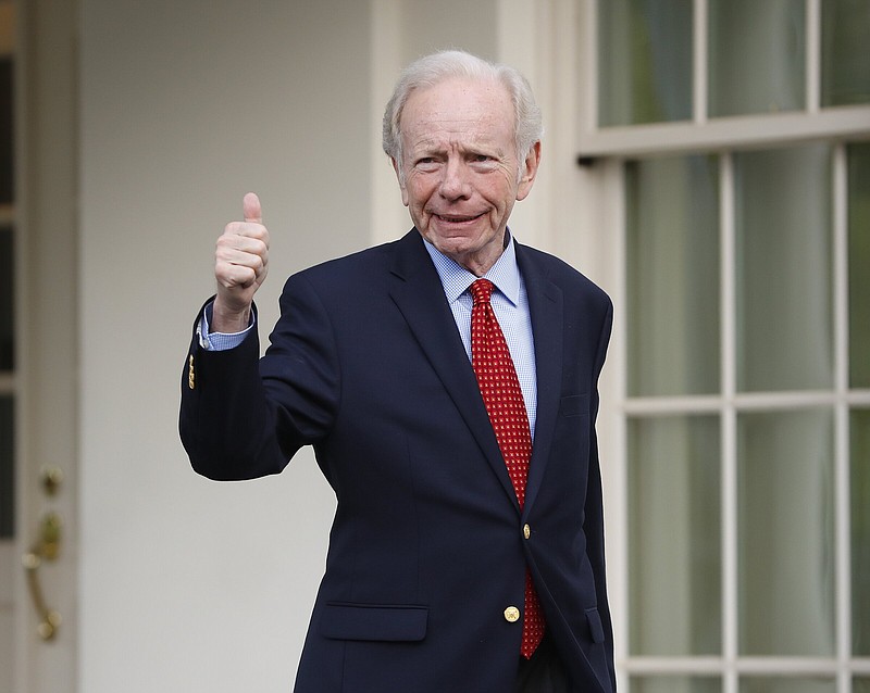 Former Connecticut Sen. Joe Lieberman gives a ‘thumbs-up’ as he leaves the West Wing of the White House in Washington, Wednesday, May 17, 2017. More photos at arkansasonline.com/328lieberman/
(AP/Pablo Martinez Monsivais)