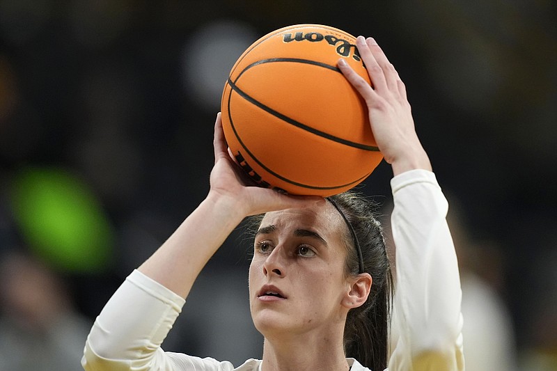 Iowa guard Caitlin Clark warms up before a second-round college basketball game against West Virginia in the NCAA Tournament, Monday, March 25, 2024, in Iowa City, Iowa. (AP Photo/Charlie Neibergall)