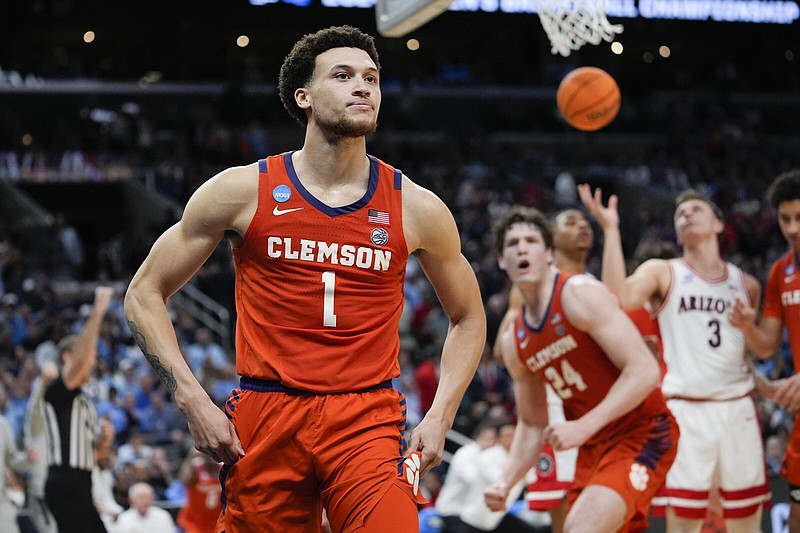 Clemson guard Chase Hunter (1) celebrates Thursday after scoring while drawing a foul during the second half of the sixth-seeded Tigers’ 77-72 victory over the No. 2 seed Arizona Wildcats in the West Region semifinals of the men’s NCAA Tournament in Los Angeles.
(AP/Ryan Sun)