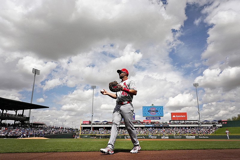 Cardinals first baseman Paul Goldschmidt walks to the dugout prior to Tuesday's spring training game against the Cubs in Mesa, Ariz. (Associated Press)