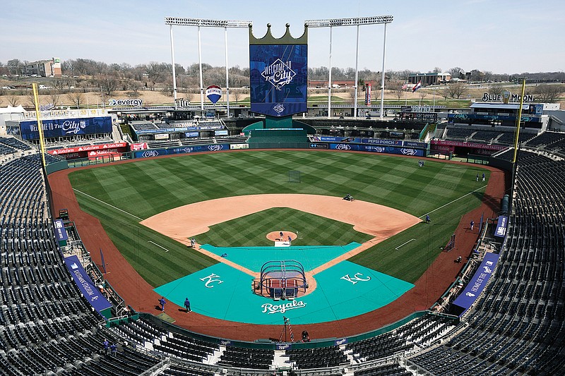In this March 29, 2023, file photo, members of the Royals’ grounds crew work to prepare for the start of the baseball season. (Associated Press)
