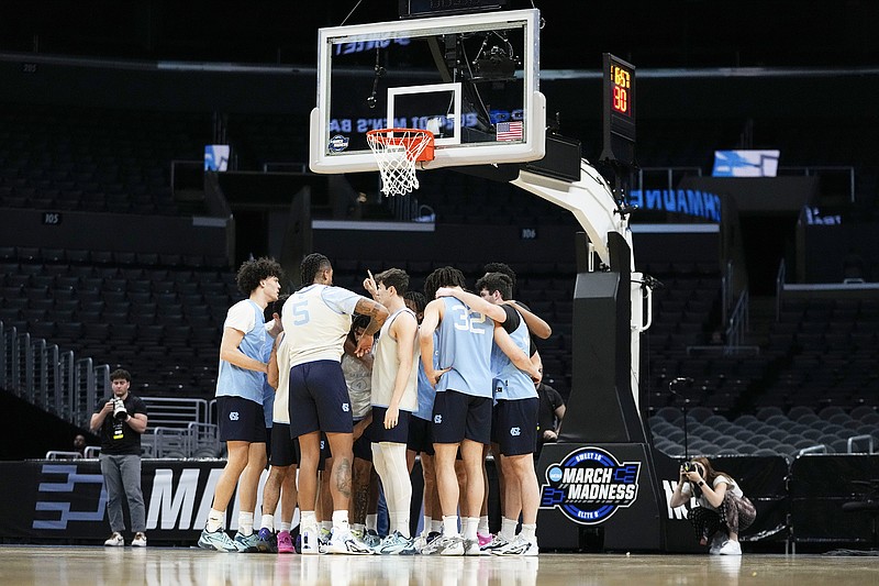 North Carolina players huddle during Wednesday's practice for the West Region in Los Angeles. (Associated Press)