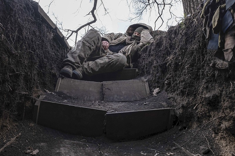 A Ukrainian soldier rests in a trench on the frontline near Lyman, Donetsk region, Ukraine, on Friday.
(AP/Iryna Rybakova)