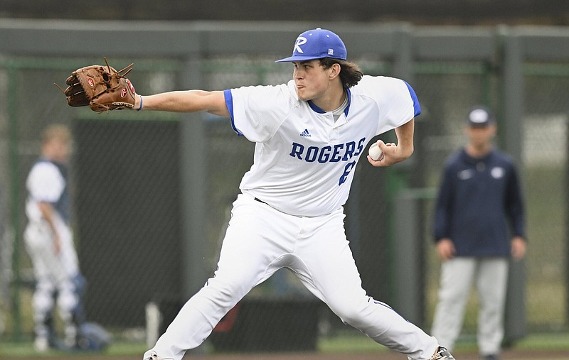 Ty Anderson of Rogers delivers a pitch during Friday’s game against Greenwood at the Mountie Baseball Complex in Rogers. More photos available at nwaonline.com/photo.
(NWA Democrat-Gazette/Charlie Kaijo)