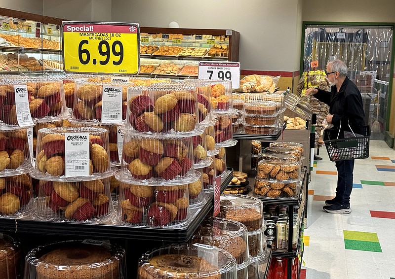 A customer shops for food at a grocery store on March 12, 2024, in San Rafael, California. (Justin Sullivan/Getty Images/TNS)