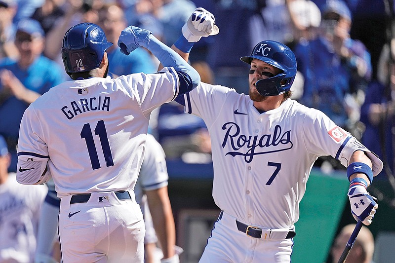 Maikel Garcia celebrates with Royals teammate Bobby Witt Jr. after hitting a solo home run during the first inning of Thursday afternoon’s game against the Twins at Kauffman Stadium in Kansas City. (Associated Press)