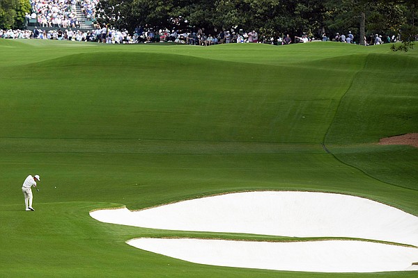 Challenging par-5 eighth hole at Augusta National has uphill climb, blind shot