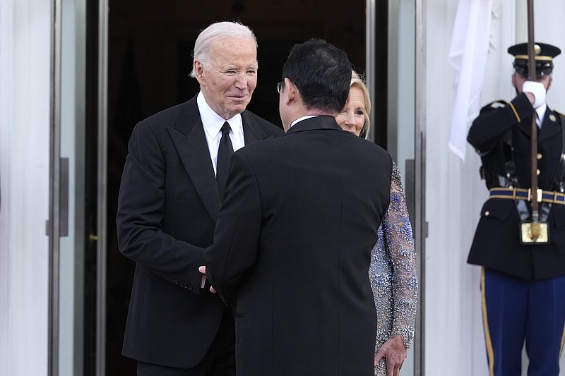 President Joe Biden (left) and first lady Jill Biden (right) welcome Japanese Prime Minister Fumio Kishida and his wife Yuko Kishida for a State Dinner at the White House on Wednesday.
(AP/Susan Walsh)