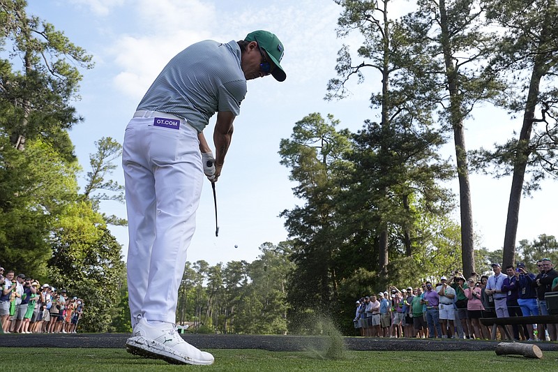 Rickie Fowler hits his tee shot on the sixth hole during a practice round in preparation for the Masters golf tournament at Augusta National Golf Club Wednesday, April 10, 2024, in Augusta, GA. (AP Photo/George Walker IV)