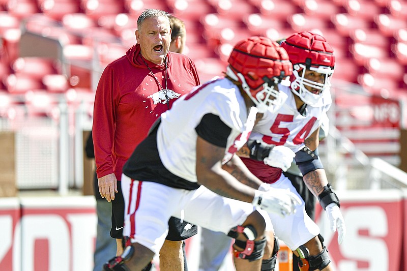 Coach Sam Pittman and the Arkansas Razorbacks have added an element of physicality to their work this spring, which wraps up today with the Red-White game at Reynolds Razorback Stadium in Fayetteville. “We are a physical team and we’re practicing physical,” Pittman said. “I think [today] will be the fifth time we’ve tackled to the ground this spring, which is by far more than we’ve done in the past.”
(NWA Democrat-Gazette/Hank Layton)