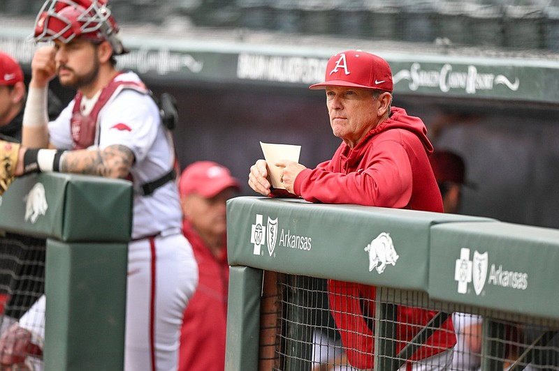 Arkansas head coach Dave Van Horn stands in the dugout before a baseball game on Wednesday, April 10, 2024, at Baum-Walker Stadium in Fayetteville. The Arkansas Razorbacks hosted the San Jose State Spartans in a non-conference matchup. Arkansas came away victorious 8-2 on a misty afternoon. Visit nwaonline.com/photo for today's photo gallery. (NWA Democrat Gazette/Caleb Grieger).