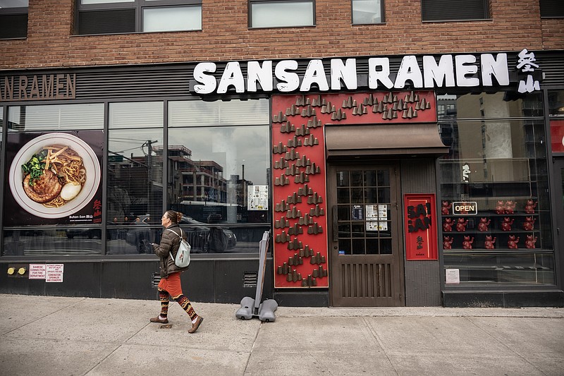 An outlet of SanSan Ramen, a chain that has incorporated remote greeters and cashiers at some of its restaurants, in New York, April 4, 2024. A handful of New York City restaurants are experimenting with virtual staff members, who greet customers on a screen via Zoom from the Philippines. (Victor J. Blue/The New York Times)