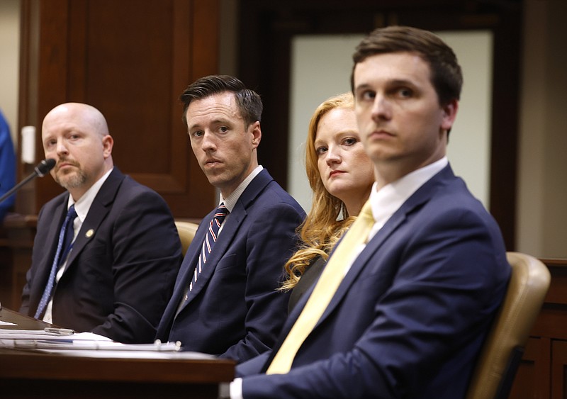 Deputy Attorney General Ryan Owsley (from left), Judd Deere, deputy chief of staff for the governor’s office and Cortney Kennedy, chief legal counsel for the governor’s office and Deputy Attorney General Noah Watson (right) listen to questions from members of the Legislative Joint Auditing Committee on Tuesday, April 16, 2024, at the state Capitol in Little Rock. .(Arkansas Democrat-Gazette/Thomas Metthe)
