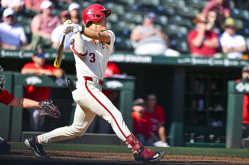 Arkansas third baseman Nolan Souza hit a solo home run — his seventh of the season — during the second inning of the No. 2 Razorbacks’ 5-4 victory over Texas Tech on Wednesday at Baum-Walker Stadium in Fayetteville. It was one of only four Arkansas hits.
(NWA Democrat-Gazette/Hank Layton)