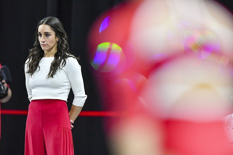 Arkansas gymnastics Coach Jordyn Wieber (left) has stacked four consecutive good recruiting classes together, putting the Razorbacks in position to compete in today’s NCAA Tournament semifinals in Fort Worth. “Everybody is just so bought in and so excited,” Wieber said. “This season more than any other it just feels like all the puzzle pieces have really come together.”
(NWA Democrat-Gazette/Hank Layton)