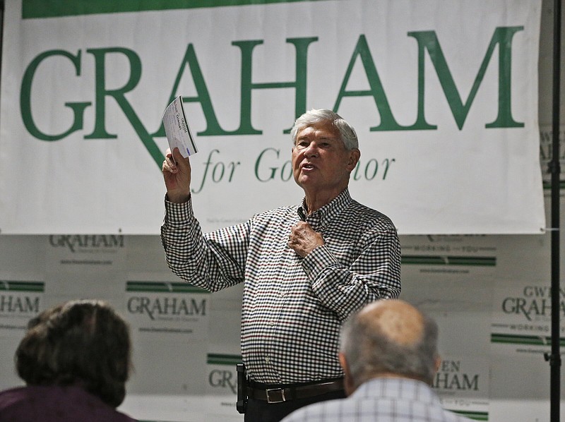 Former Florida Gov. and Senator Bob Graham speaks as he and other family members help open his daughter Gwen Graham’s gubernatorial field office in Miami on July 24, 2018.
(AP/Wilfredo Lee)