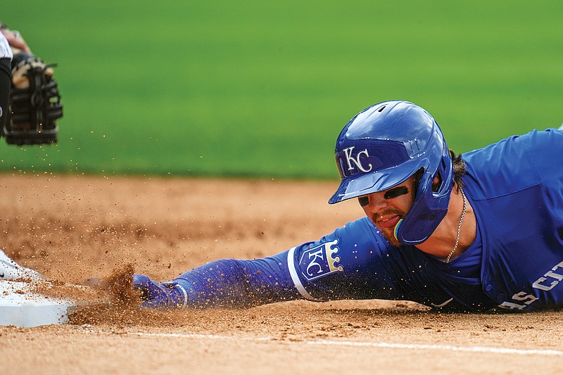 Bobby Witt Jr. of the Royals dives safely back to first base on a pickoff attempt during the first game of Wednesday’s doubleheader against the White Sox in Chicago. (Associated Press)