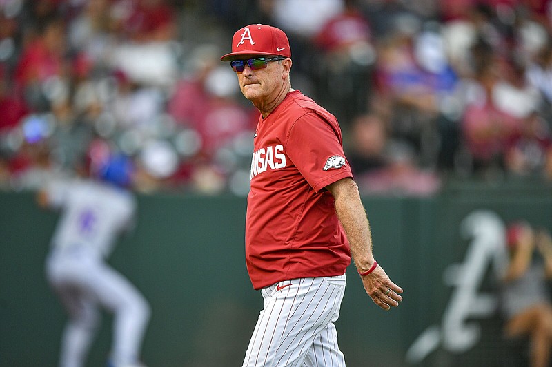 Arkansas head coach Dave Van Horn walks to the dugout after making a pitching change, Saturday, April 27, 2024, during the fourth inning of the Razorbacks’ 9-5 loss to the Florida Gators in the nightcap of a doubleheader at Baum-Walker Stadium in Fayetteville. Visit nwaonline.com/photo for today's photo gallery..(NWA Democrat-Gazette/Hank Layton)