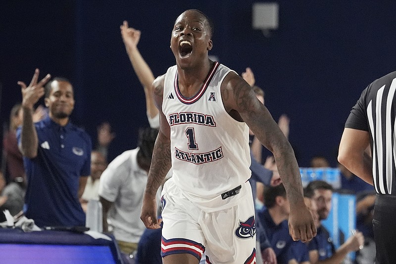 Florida Atlantic guard Johnell Davis (1) celebrates after scoring a three-point shot during the second half of an NCAA college basketball game against Wichita State , Thursday, Jan. 18, 2024, in Boca Raton, Fla. (AP Photo/Marta Lavandier)