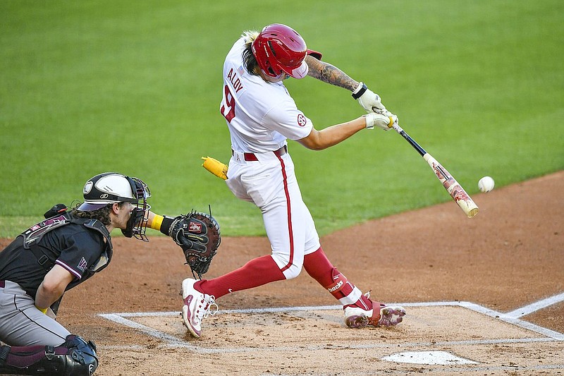 Arkansas shortstop Wehiwa Aloy (9) hits a grand slam during a game against Missouri State on Tuesday, April 30, 2024, in Fayetteville. (Hank Layton/NWA Democrat-Gazette)