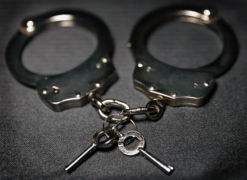 FILE - A pair of handcuffs are shown in this 2024 file photo. (Arkansas Democrat-Gazette/Kyle McDaniel photo illustration)