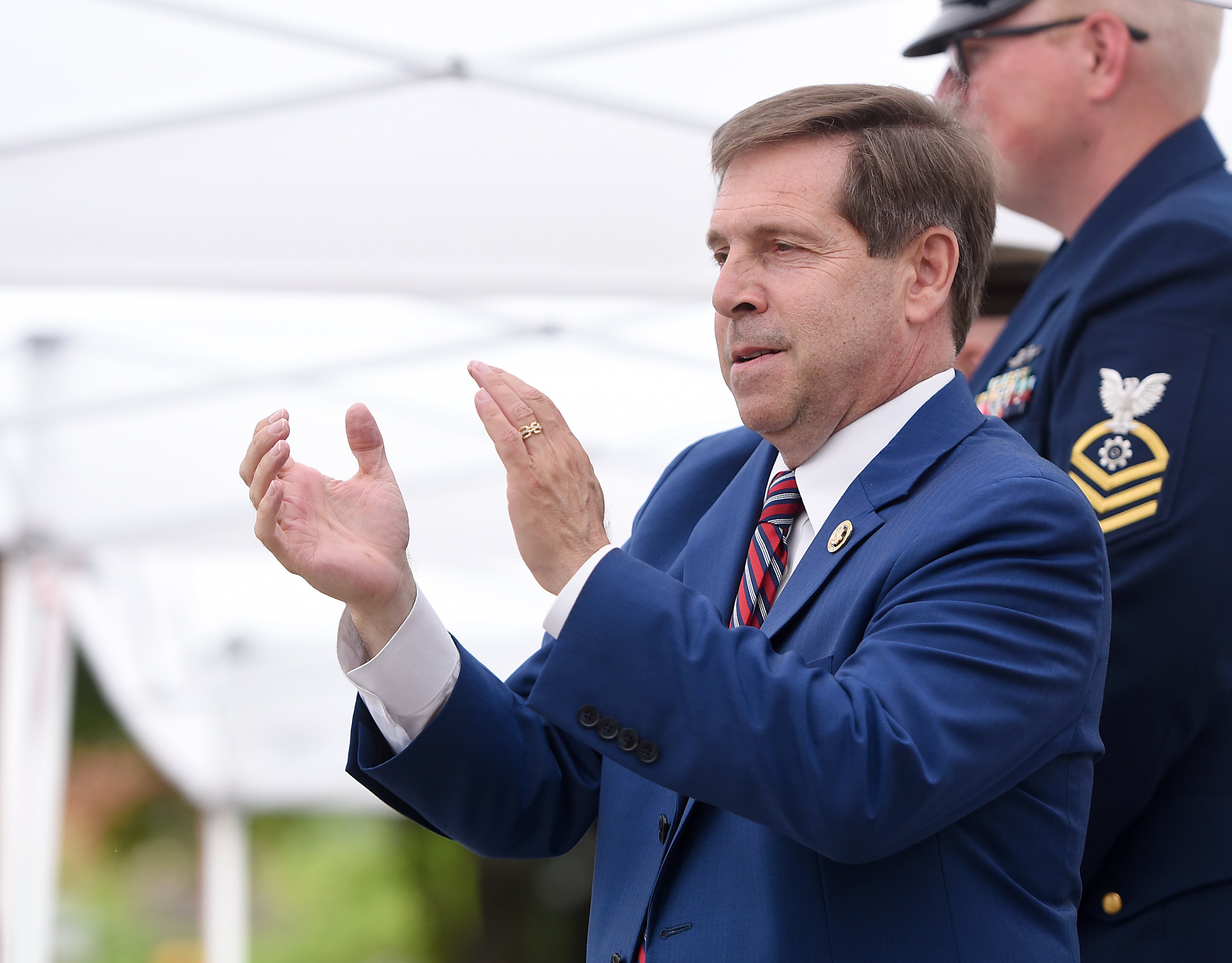 Staff photo by Matt Hamilton/ Rep. Chuck Fleischmann watches the parade at a viewing area on W. Aquarium Way during the 75th Armed Forces Day Parade on Friday, May 3, 2024.