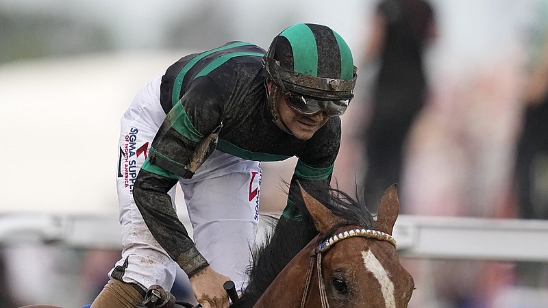 Brian Hernandez Jr. celebrates after riding Mystik Dan to victory at the 150th Kentucky Derby on May 4 in Louisville, Ky. Trainer Kenny McPeek announced Saturday that Mystik Dan is heading to the Preakness Stakes, the second of three Triple Crown races.
(AP/Brynn Anderson)