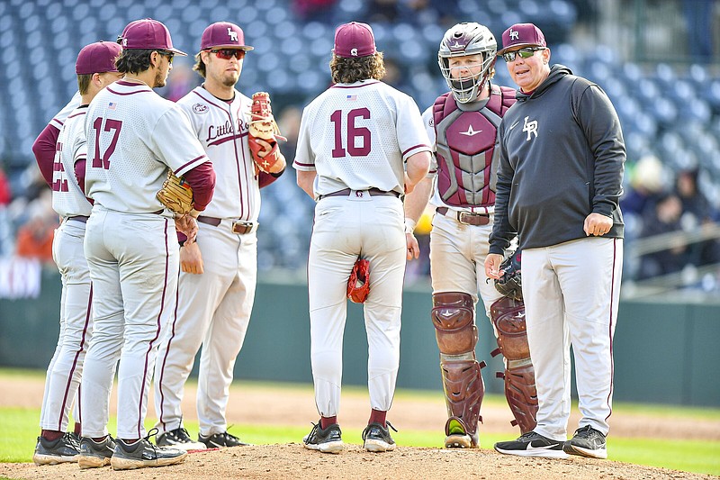 UALR Coach Chris Curry (right) and the Trojans are the top seed in the Ohio Valley Conference Tournament which is being played in Marion, Ill. With a double bye, the Trojans have earned a spot in the quarterfinal round of the tournament.
(NWA Democrat-Gazette/Hank Layton)